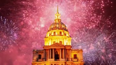 Celebratory colorful fireworks over the Les Invalides (The National Residence of the Invalids) at night. Paris, France