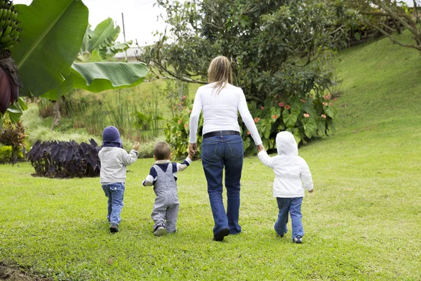Madre encantadora con sus hijos al aire libre —  Fotos de Stock