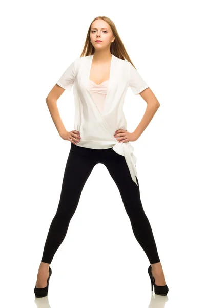 Full length studio shot of pretty young woman standing looking a — Stock Photo, Image