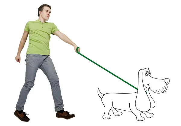 白い背景の上に犬を連れて歩いて男 — ストック写真