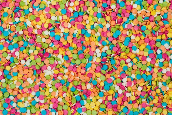 Multi-colorido decoração de doces fundo — Fotografia de Stock