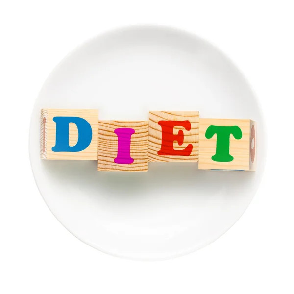 White plate with word diet composed of wooden cubes — Stock Photo, Image