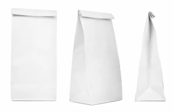 Set de bolsas de papel en blanco aisladas sobre fondo blanco — Foto de Stock