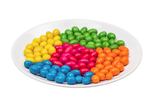 White plate full of candy — Stock Photo, Image