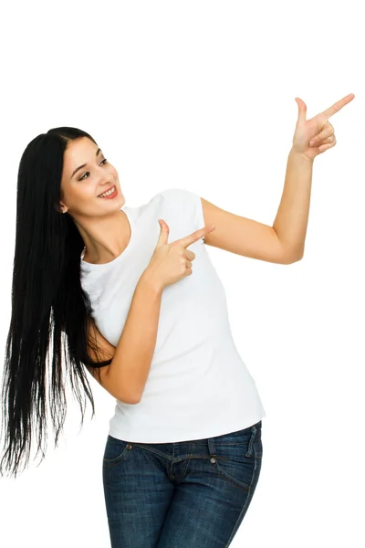Young woman pointing up at copy space — Stock Photo, Image
