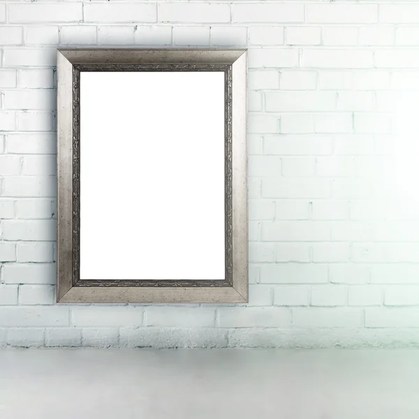 Blank vintage frame on white brick wall — Stock Photo, Image