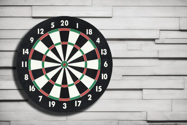 Darts board on a vintage wall — Stock Photo, Image