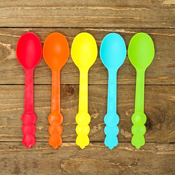Colorful plastic spoons — Stock Photo, Image