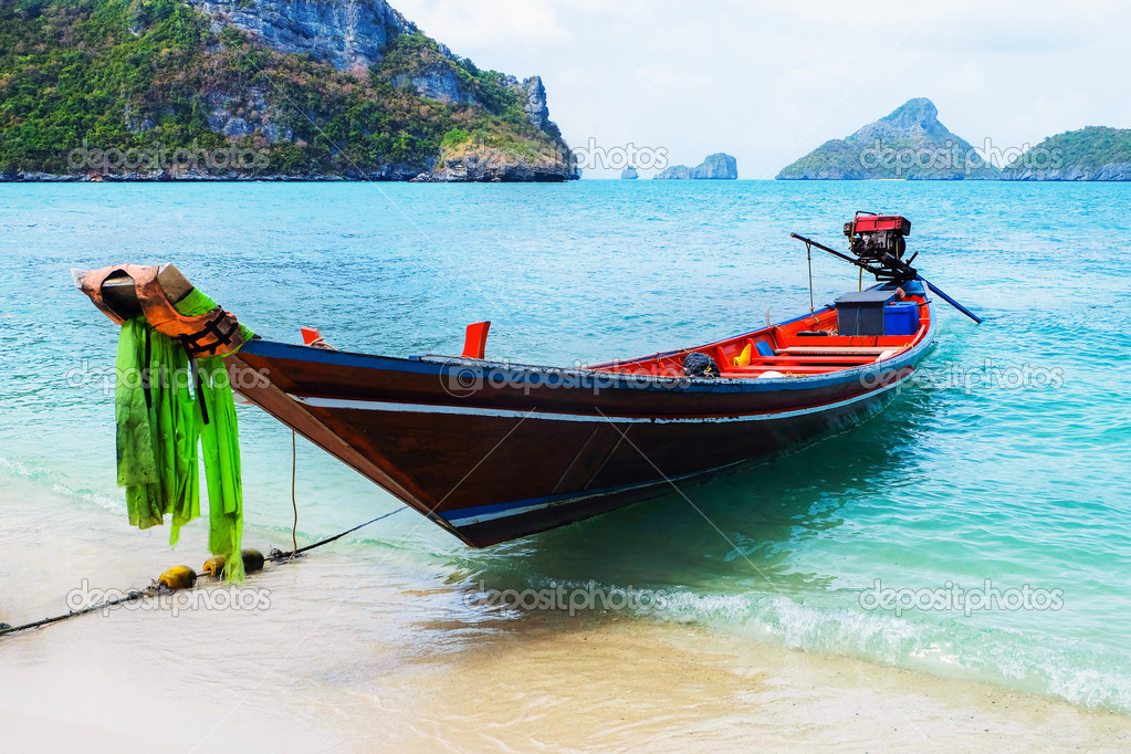 Long tail boat on beach