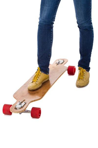 Skateboardåkares fötter och skateboard — Stockfoto