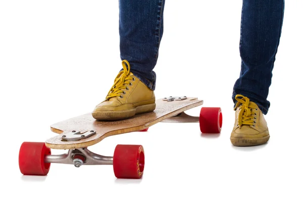 Skateboarder on longboard skateboard — Stock Photo, Image