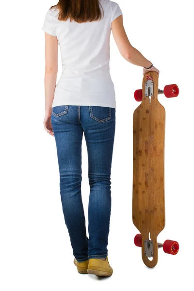 女人控股滑板 — 图库照片