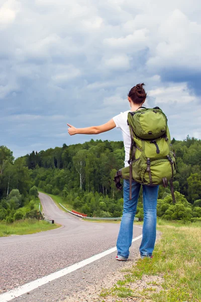 Woman with backpack — Stock Photo, Image