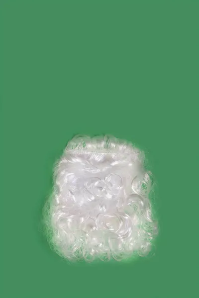 White Fake Beard Green Background Santa Beard Christmas Minimal Concept — Stock Photo, Image