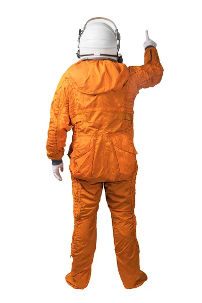 Astronaut met een oranje ruimtepak en een ruimtehelm die iets of handgebaar aanraakt of geïsoleerd is op een witte achtergrond — Stockfoto