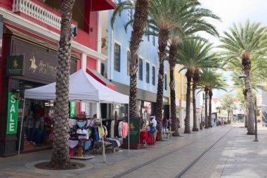 ORANJESTAD, ARUBA - DECEMBER 4, 2021: Caya G. F. Betico Croes pedestrian zone, the main shopping street in the city center of Oranjestad on the Caribbean island of Aruba