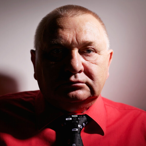 Confident aged man portrait