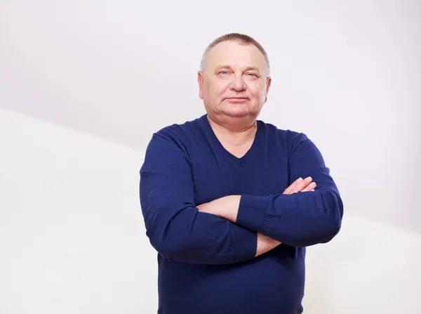 Portrait of senior man in jumper — Stock Photo, Image