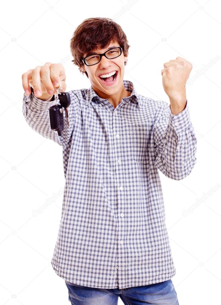 Happy young man with car keys