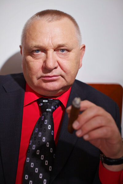 Confident boss with cigar