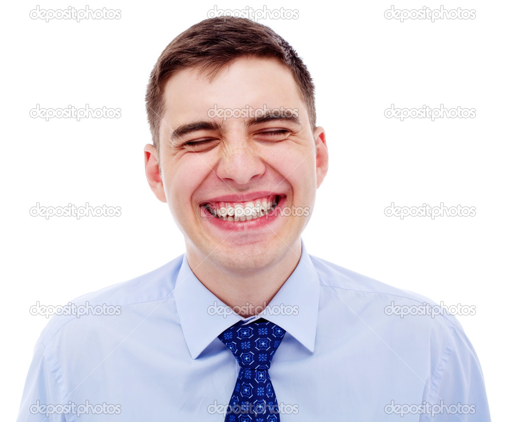 Portrait of young laughing businessman