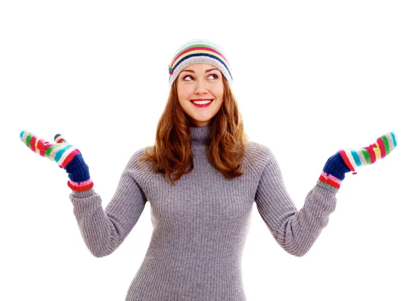 女孩在针织服装中的捕获的雪花 — 图库照片