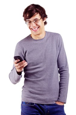 Joyful guy enjoying his cell phone