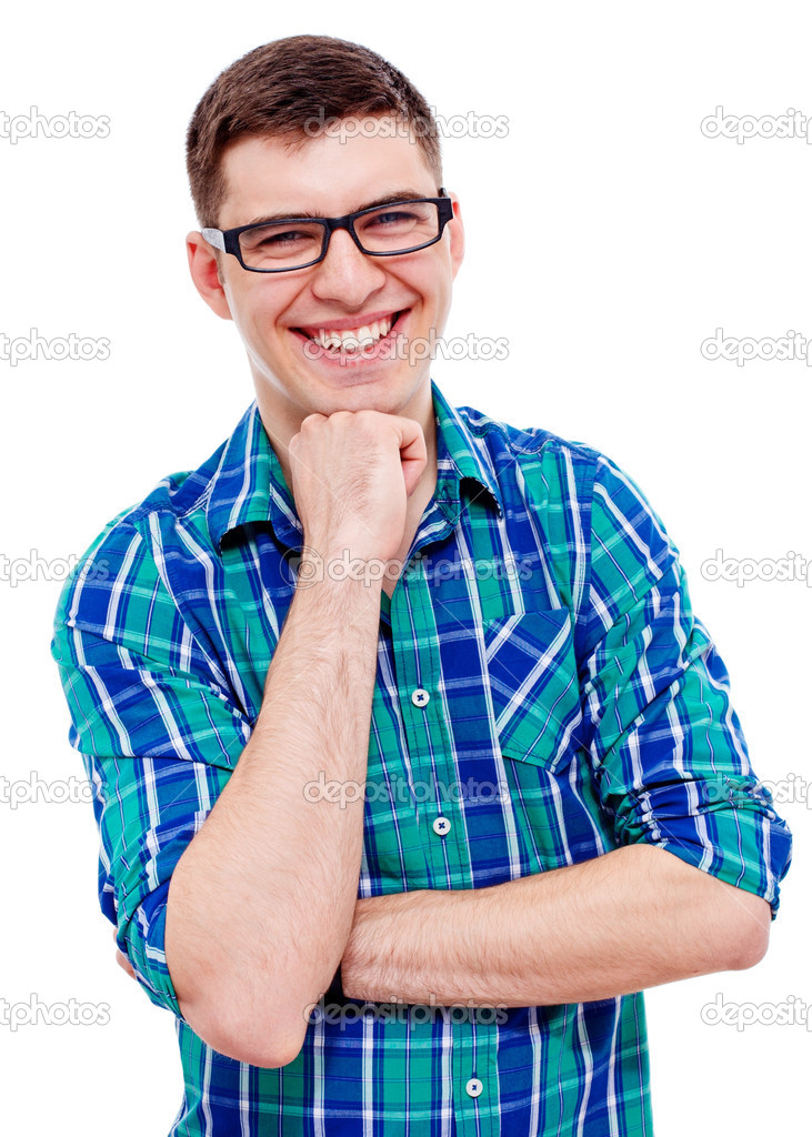 Cheerful guy in glasses with hand near chin over white