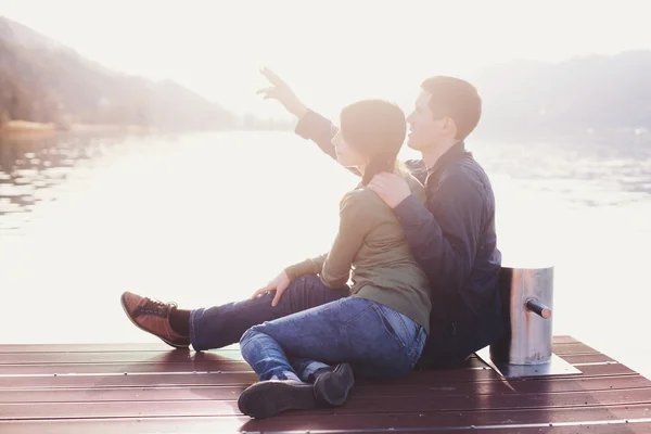 Romantic couple enjoying sunset — Stock Photo, Image