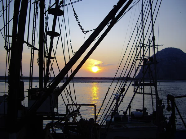 Fishing boat at sunset — Stock Photo, Image