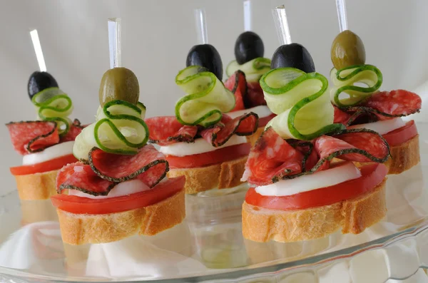 Canapés with salami — Stockfoto