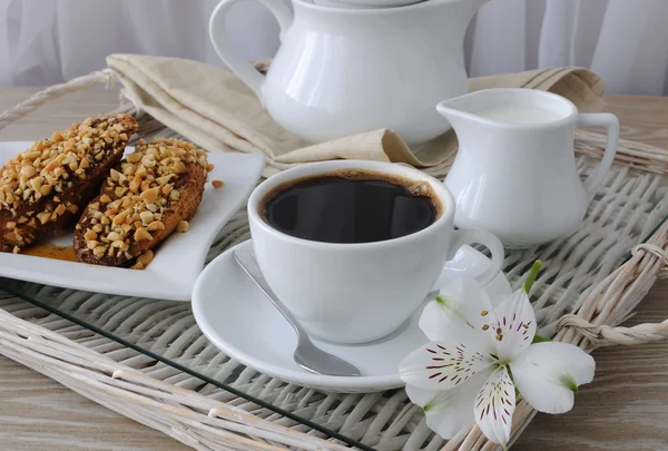 French toast with walnuts and cinnamon and a cup of coffee — Stock Photo, Image