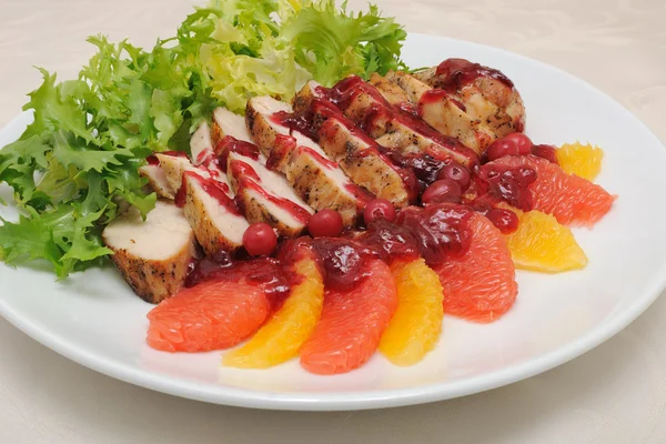 Sliced baked fillet with cranberry sauce — Stock Photo, Image