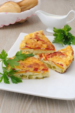 slices of omelette with vegetables clipart