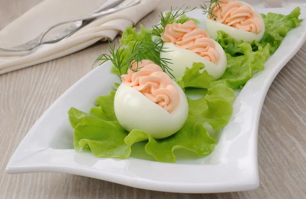 Eggs stuffed with salmon pate — Stock Photo, Image
