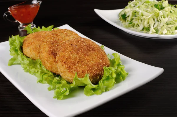 Chicken cutlets in breadcrumbs — Stock Photo, Image