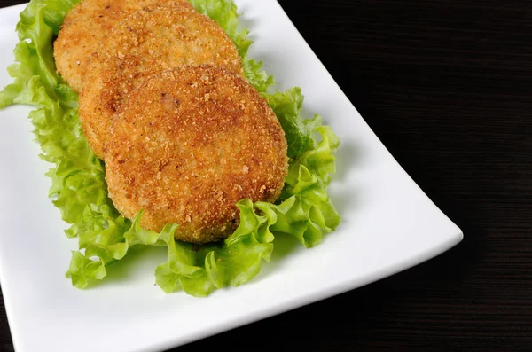 Chicken cutlets in breadcrumbs — Stock Photo, Image