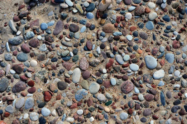 Stenen op zand — Stockfoto