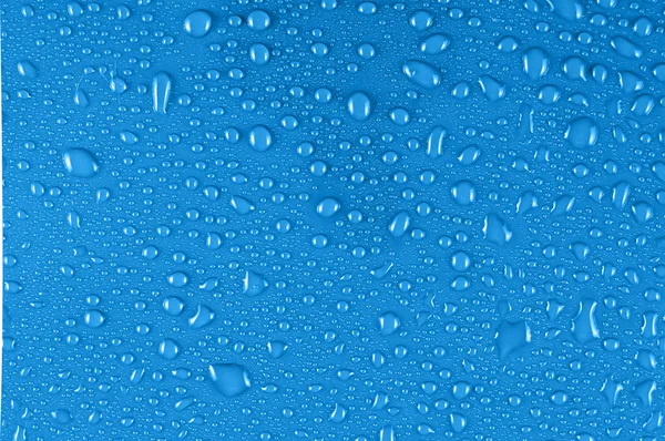 Gotas de água em azul — Fotografia de Stock