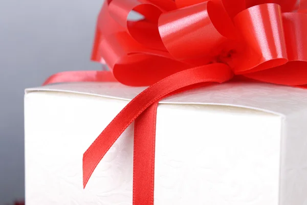 Box with red bow — Stock Photo, Image