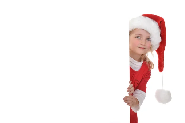 Mädchen mit Weihnachtsmütze — Stockfoto