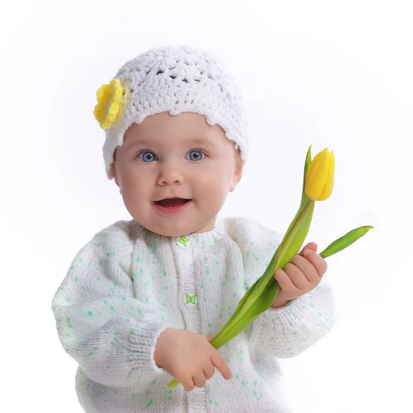 Menina bebê com tulipa — Fotografia de Stock