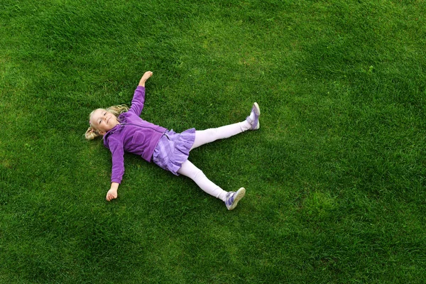 Girl on grass — Stock Photo, Image