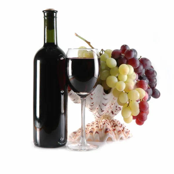 Different grapes and glass of wine on whie — Stock Photo, Image