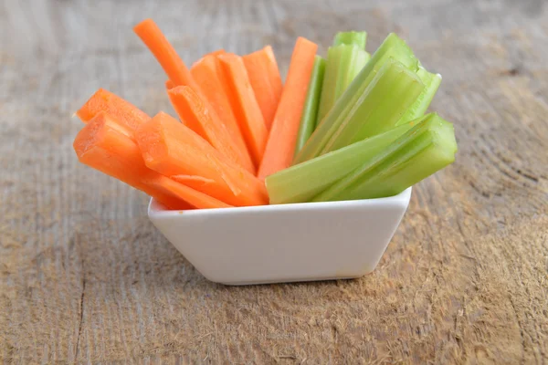Bowl of carrot and celery — Stock Photo, Image
