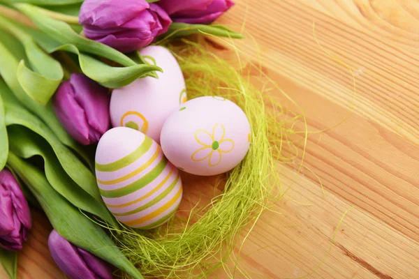 Easter eggs and tulip — Stock Photo, Image