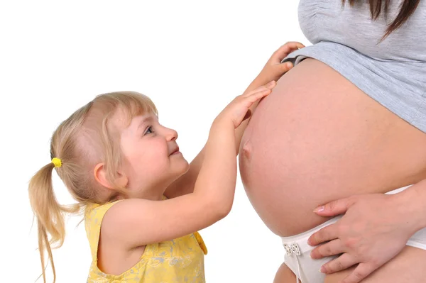 Menina com mãe grávida — Fotografia de Stock