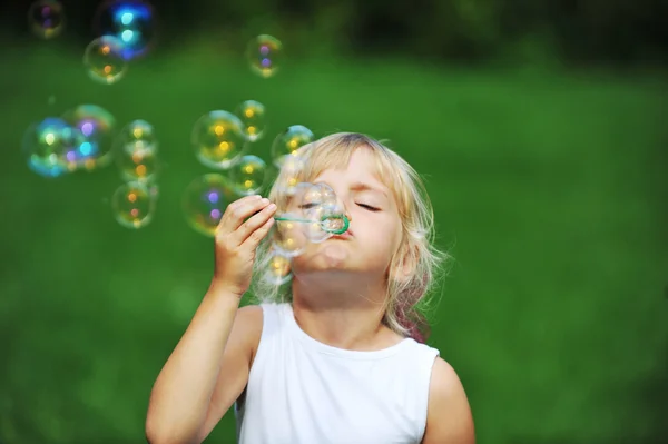 Girl with bubble blower — Stock Photo, Image