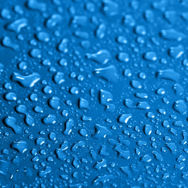 Gotas de agua sobre fondo de color —  Fotos de Stock