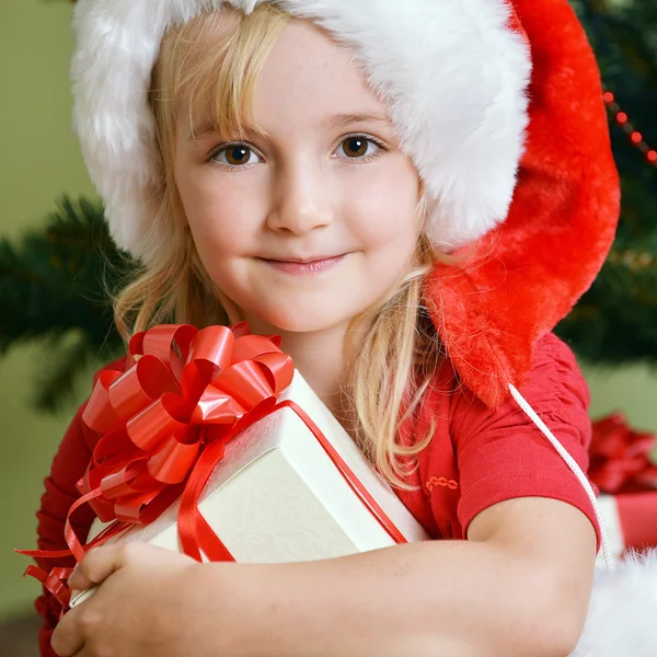 Menina em santa cap — Fotografia de Stock